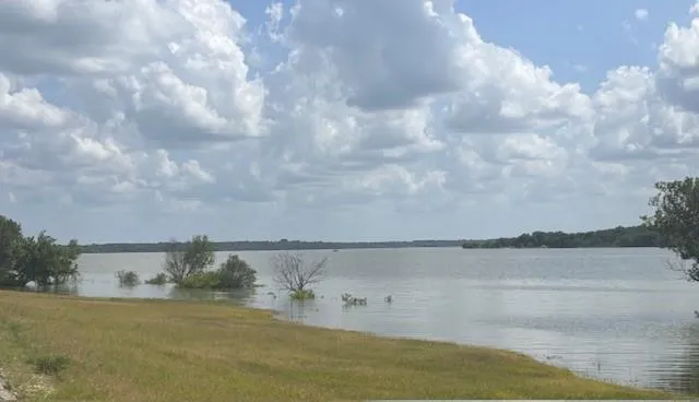 a view of outdoor space with mirror