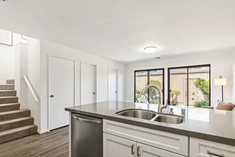 a view with a sink and large window