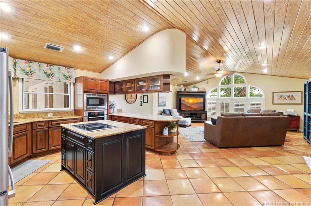 2087 Southwest Danforth Circle Palm City, FL 34990 - Photo 4 of 66 Open kitchen and family room