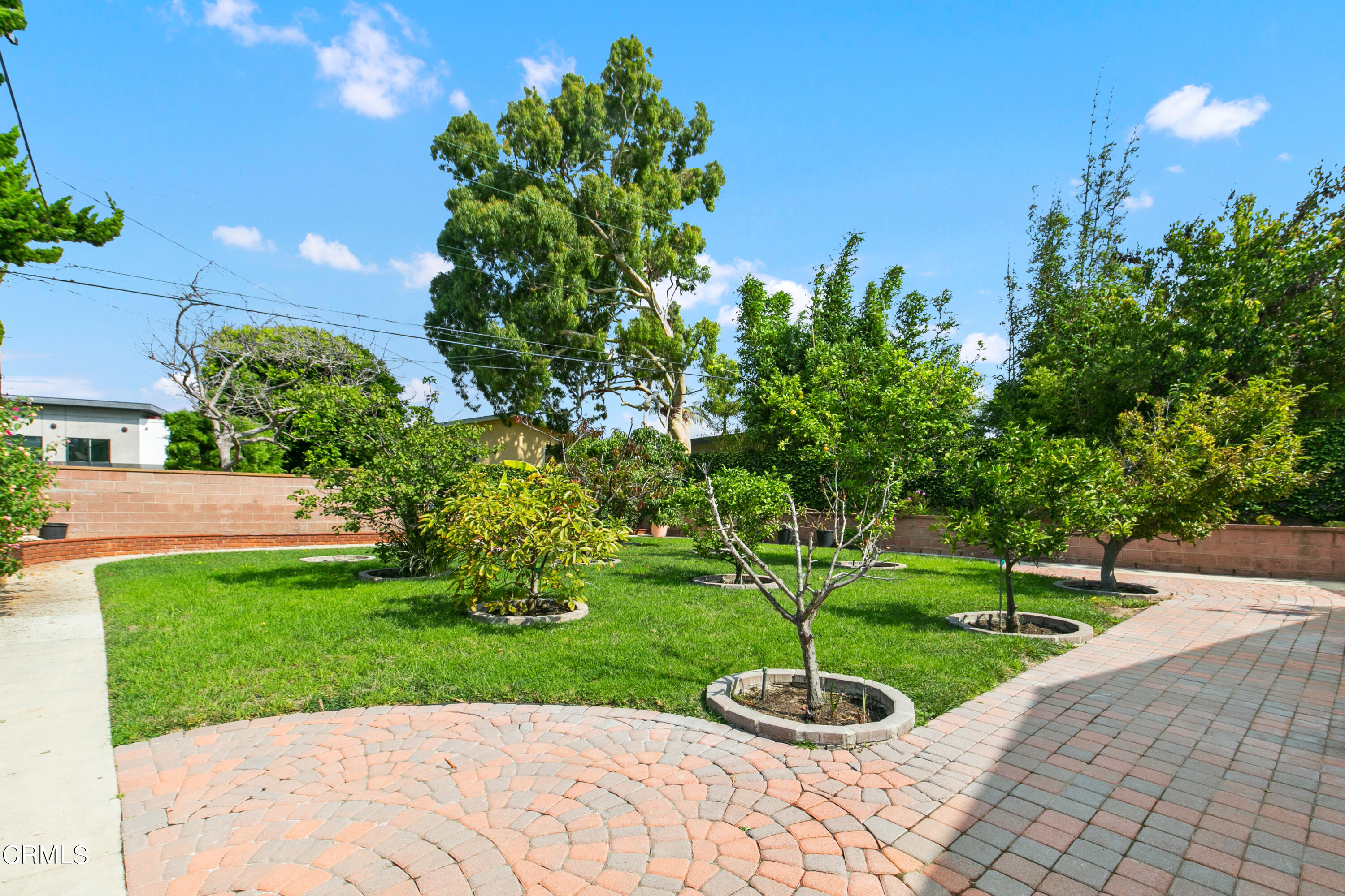 4721 Reese Road Torrance, CA 90505 - Photo 27 of 32 a view of a garden with a fountain