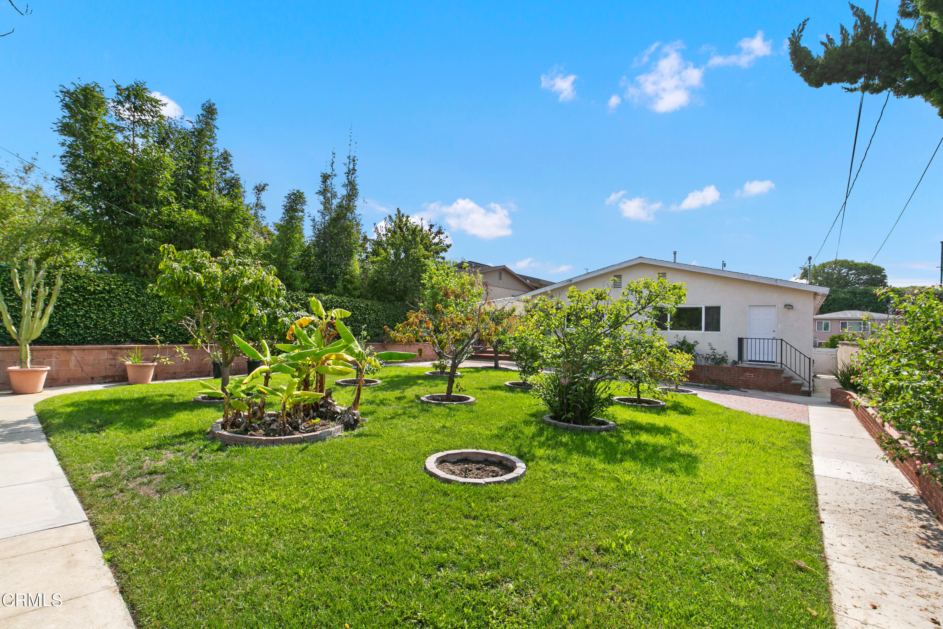 4721 Reese Road Torrance, CA 90505 - Photo 28 of 32 a view of an house with backyard space and garden