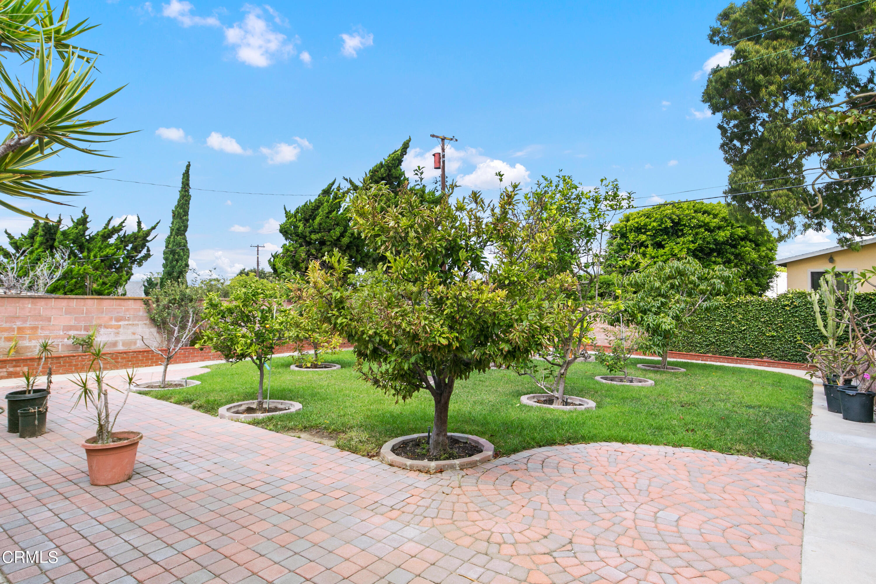 4721 Reese Road Torrance, CA 90505 - Photo 29 of 32 a park view with a fountain and a garden