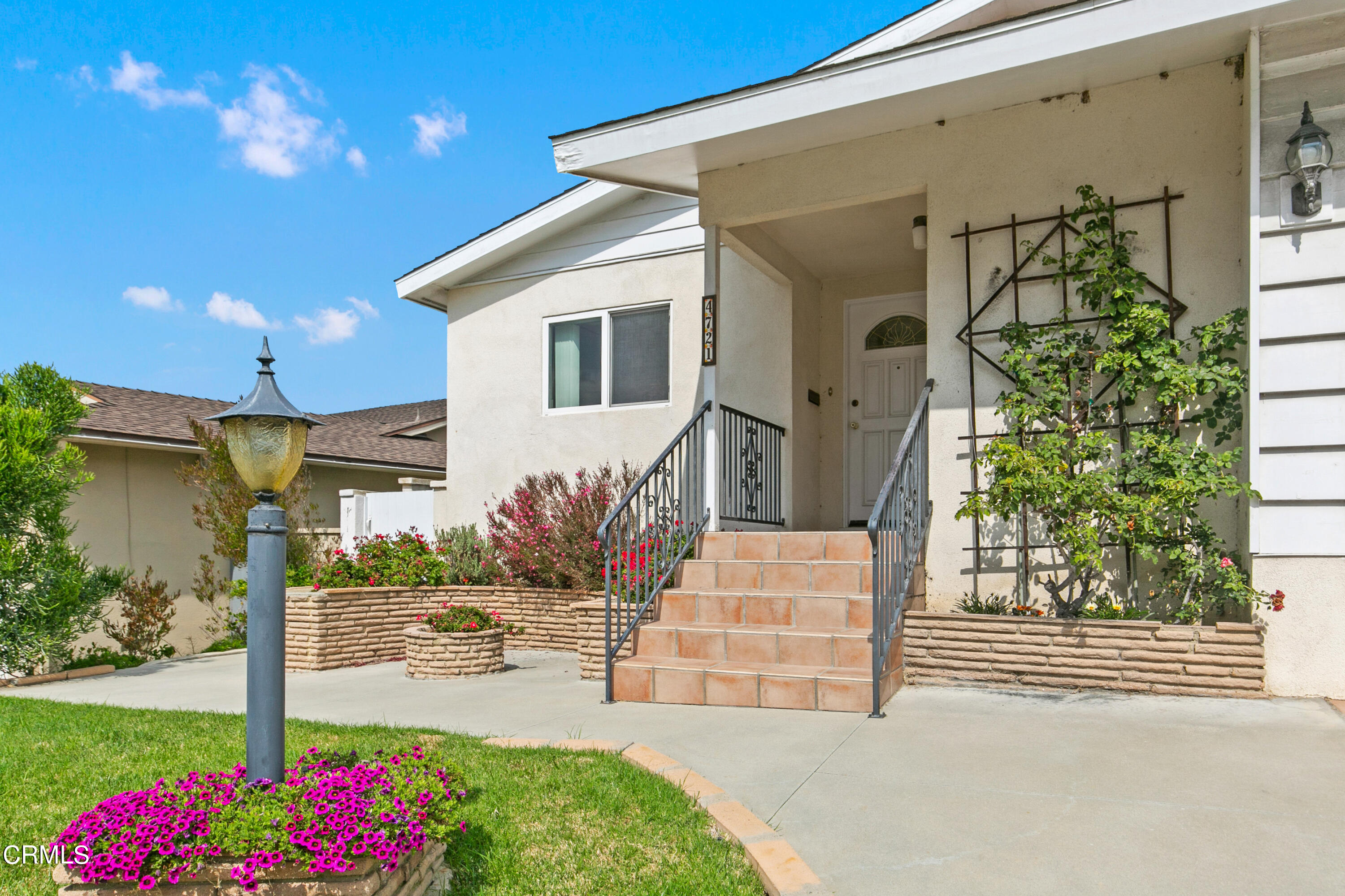 4721 Reese Road Torrance, CA 90505 - Photo 4 of 32 a front view of a house with garden