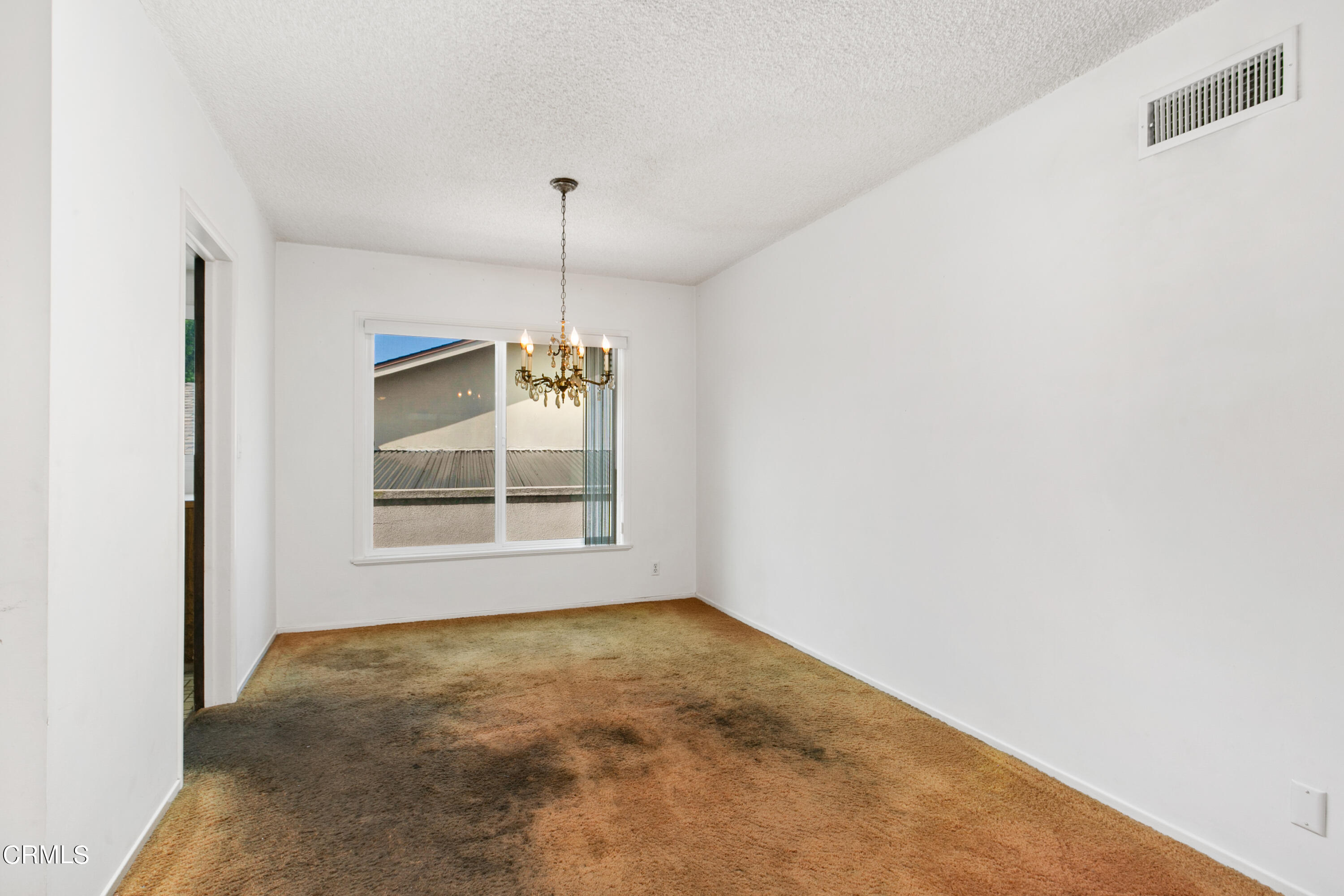 4721 Reese Road Torrance, CA 90505 - Photo 10 of 32 a view of an empty room with a window