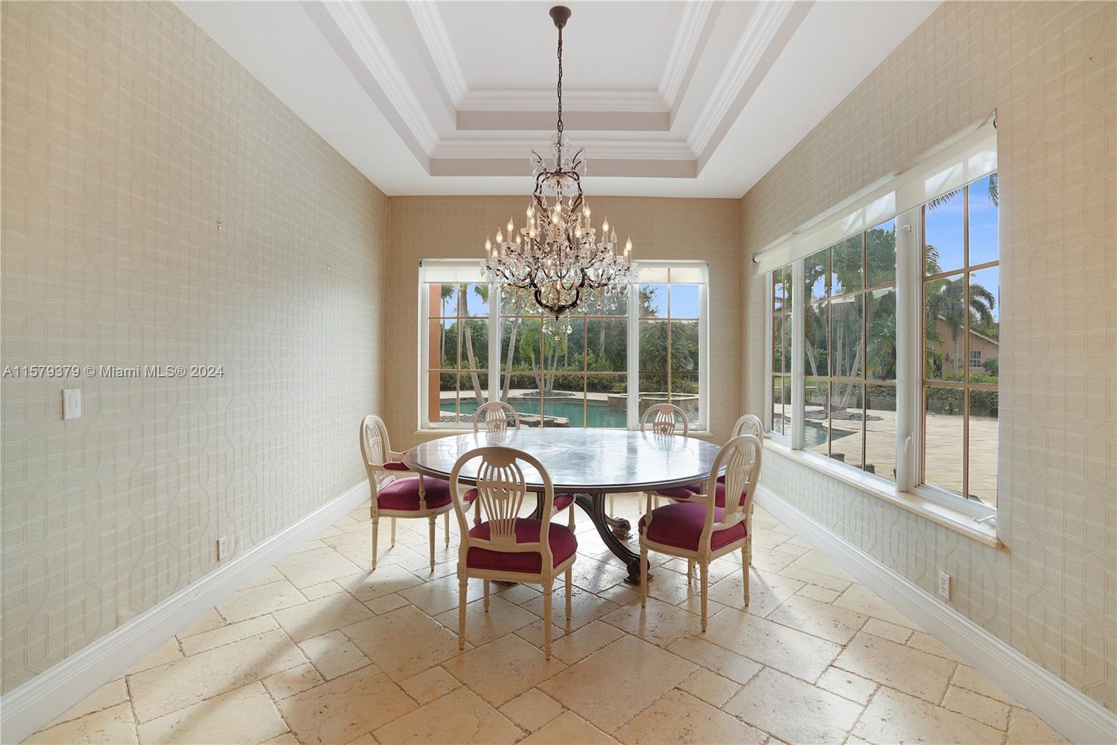 6225 Stallion Way Southwest Ranches, FL 33330 - Photo 11 of 56 a view of a dining room with furniture wooden floor and chandelier