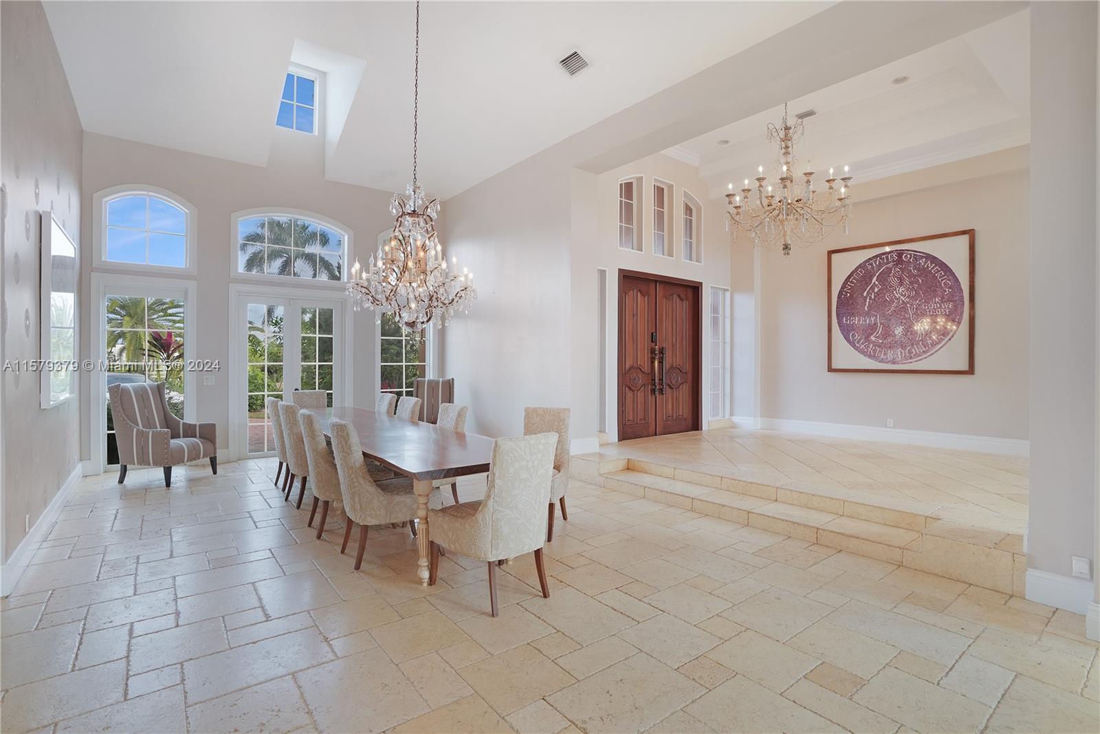 6225 Stallion Way Southwest Ranches, FL 33330 - Photo 13 of 56 a view of a dining room with furniture and chandelier