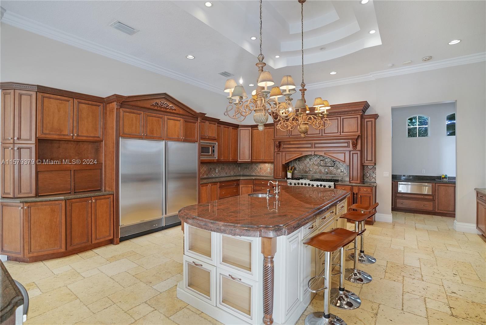 6225 Stallion Way Southwest Ranches, FL 33330 - Photo 14 of 56 a kitchen with refrigerator and cabinets