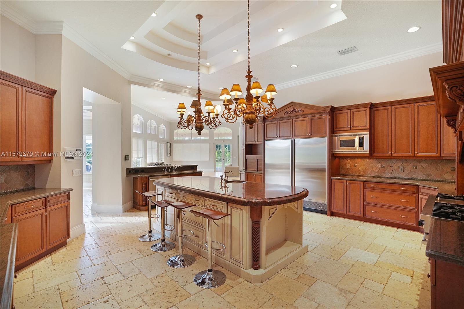 6225 Stallion Way Southwest Ranches, FL 33330 - Photo 15 of 56 a kitchen with stainless steel appliances a sink a stove a refrigerator and cabinets