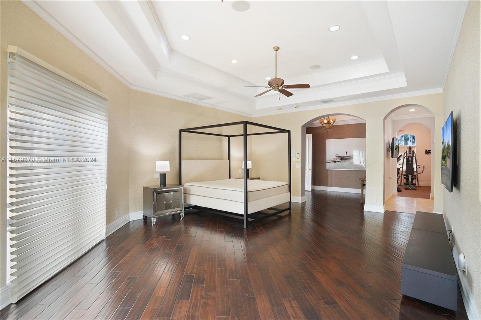 6225 Stallion Way Southwest Ranches, FL 33330 - Photo 20 of 56 a view of a room with wooden floor window and a kitchen space