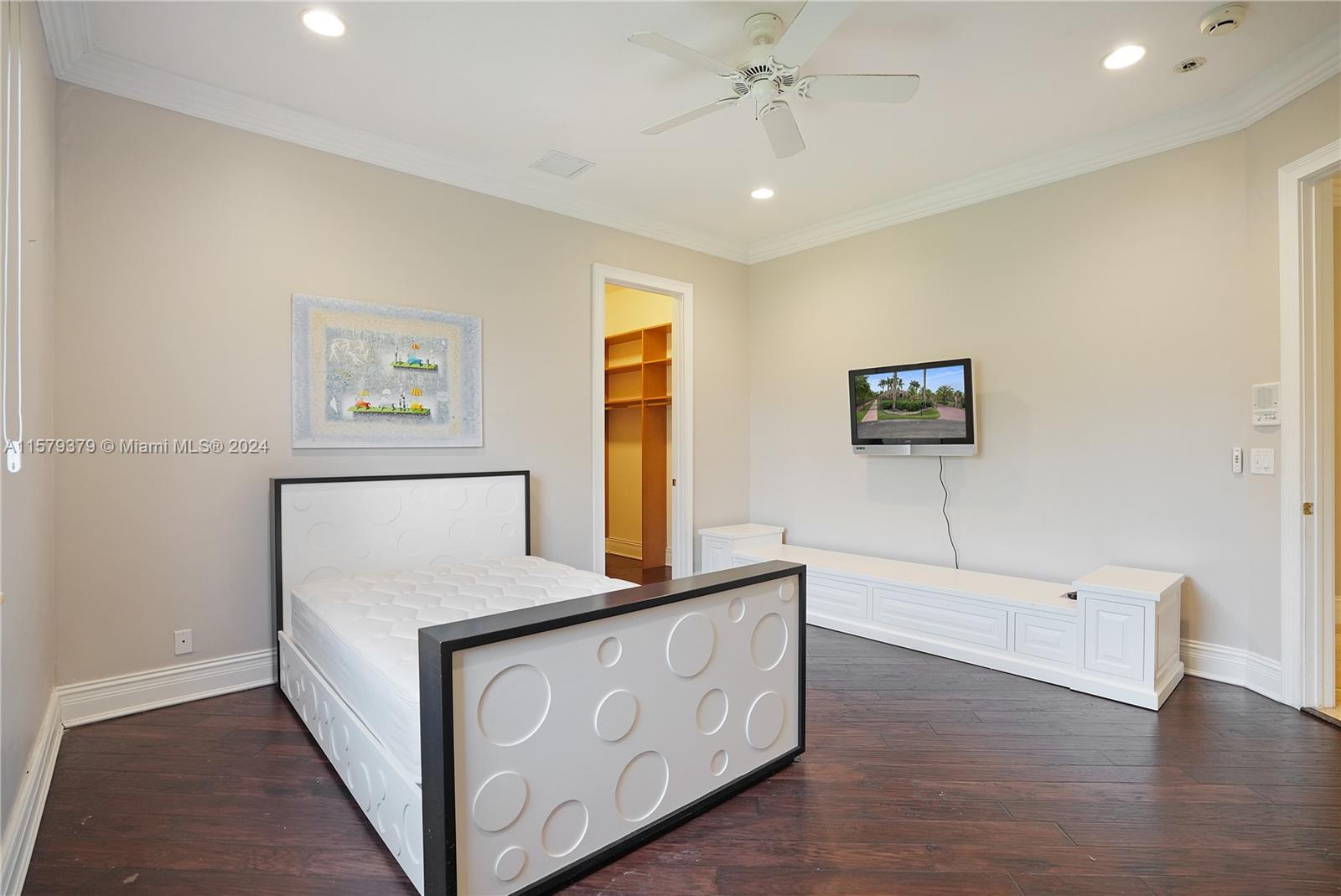 6225 Stallion Way Southwest Ranches, FL 33330 - Photo 25 of 56 a bedroom with a bed and a dresser