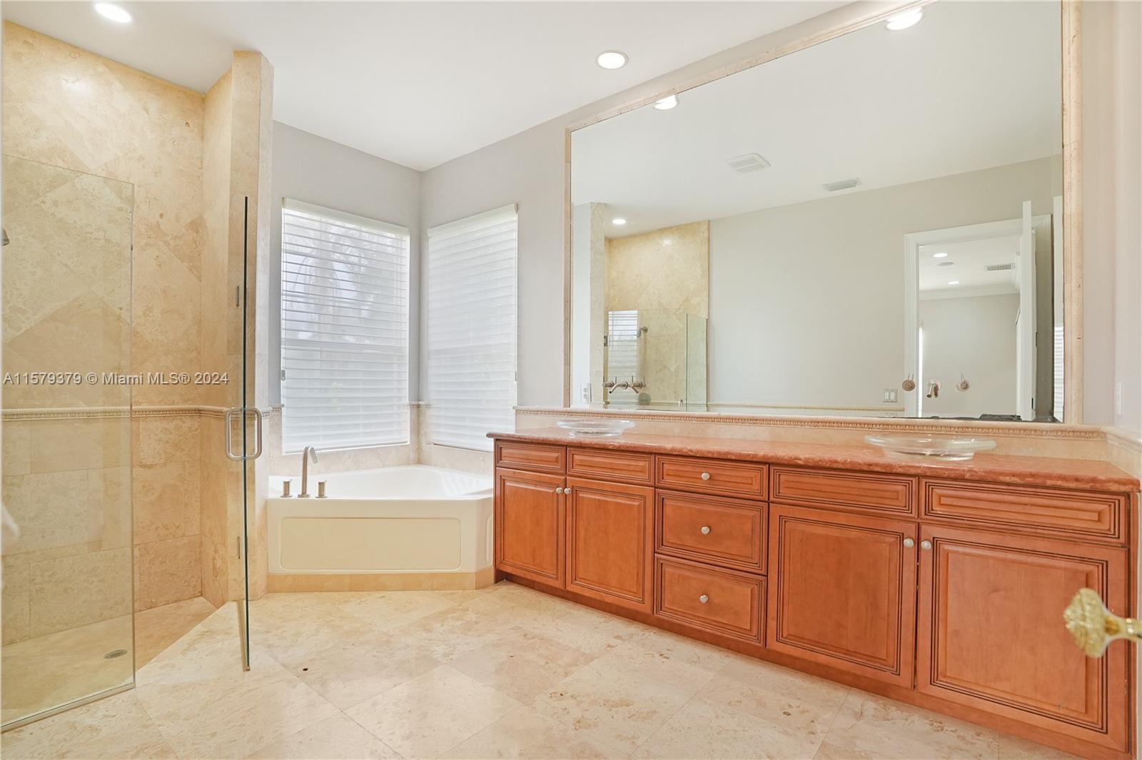 6225 Stallion Way Southwest Ranches, FL 33330 - Photo 29 of 56 a spacious bathroom with a tub sink and mirror