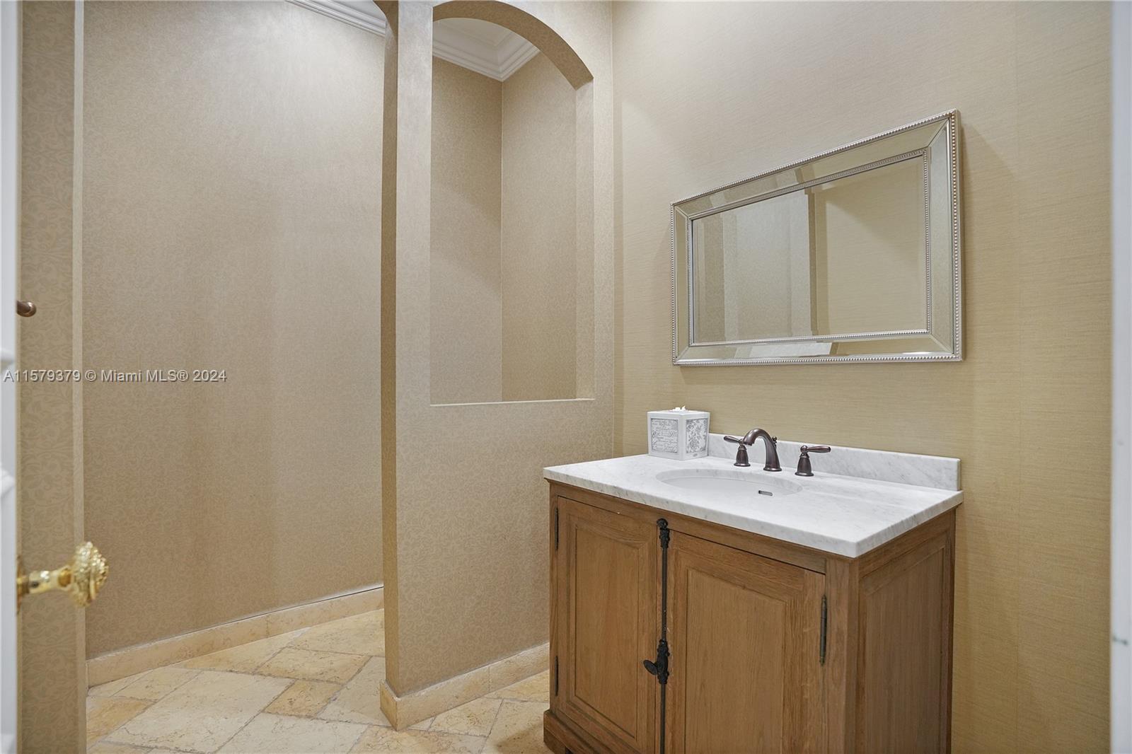 6225 Stallion Way Southwest Ranches, FL 33330 - Photo 30 of 56 a bathroom with a sink and a mirror