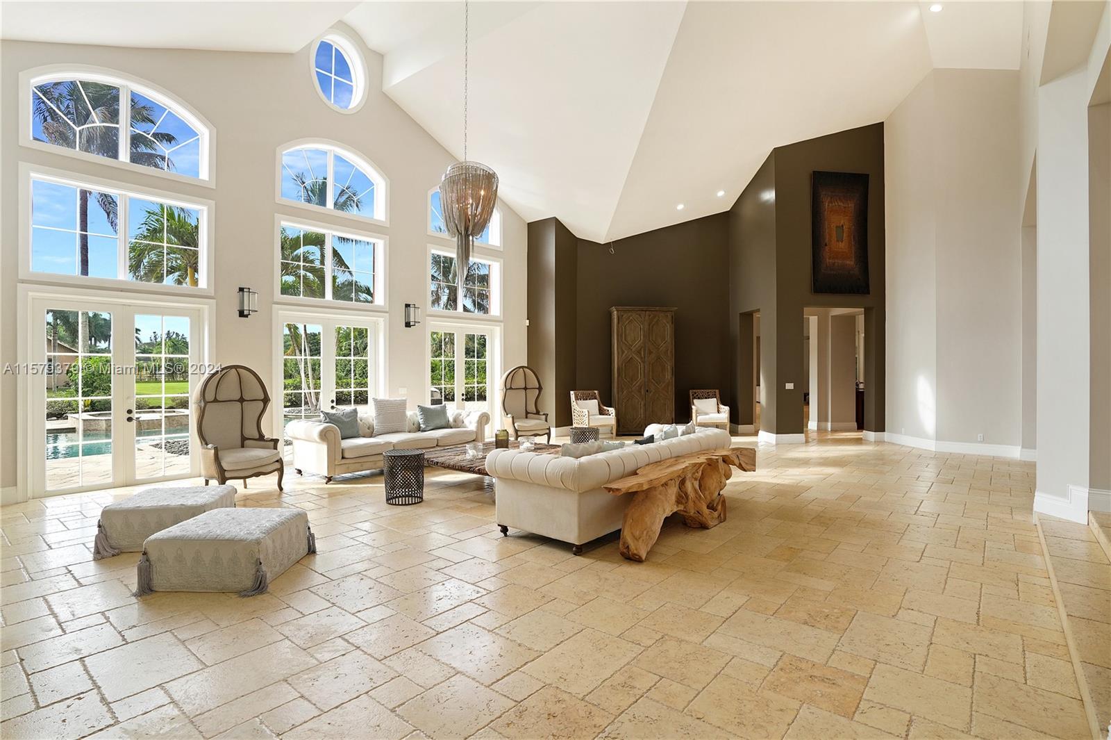 6225 Stallion Way Southwest Ranches, FL 33330 - Photo 3 of 56 a living room with furniture and large windows