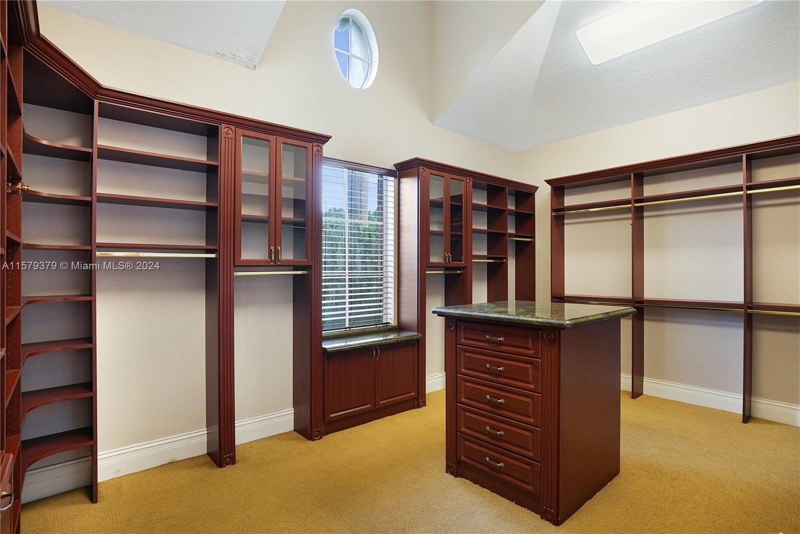 6225 Stallion Way Southwest Ranches, FL 33330 - Photo 34 of 56 a view of walk in closet with clothes and shoes