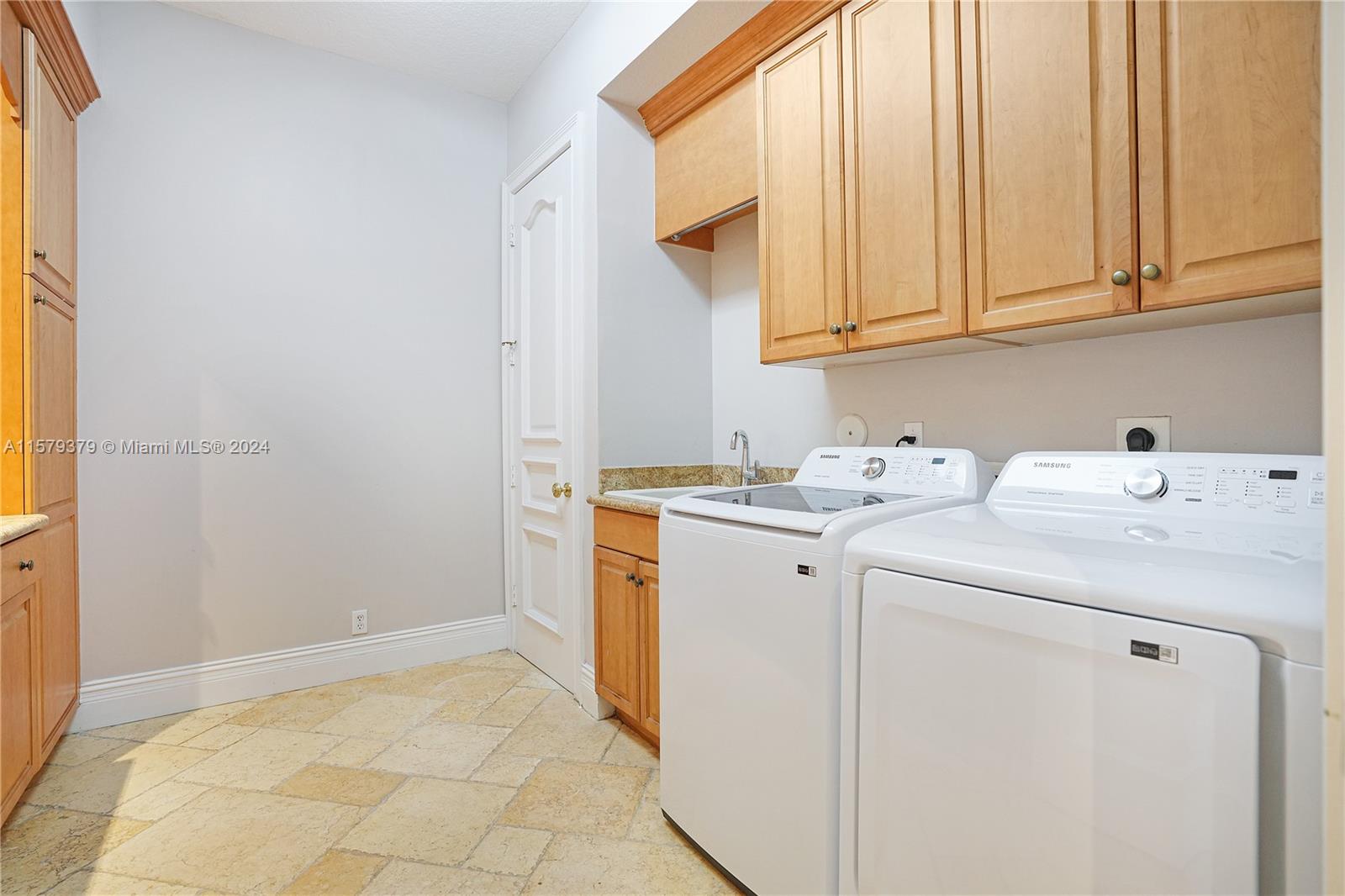 6225 Stallion Way Southwest Ranches, FL 33330 - Photo 45 of 56 a utility room with dryer and washer