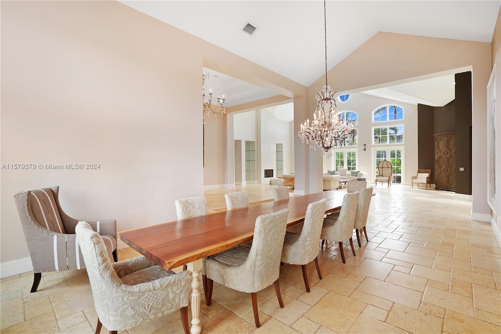 6225 Stallion Way Southwest Ranches, FL 33330 - Photo 7 of 56 a view of a dining room with furniture and chandelier