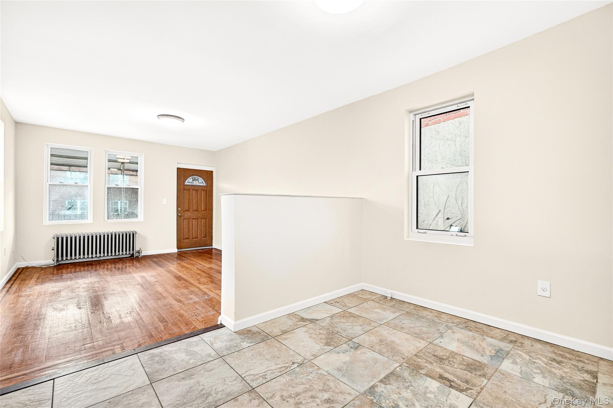 989 Sacket Avenue Bronx, NY 10462 - Photo 7 of 29 an empty room with windows