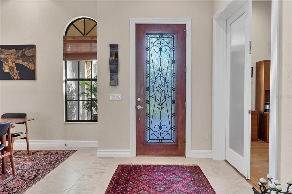 14519 Leopard Creek Place Lakewood Ranch, FL 34202 - Photo 11 of 56 a view of an entryway with a rug