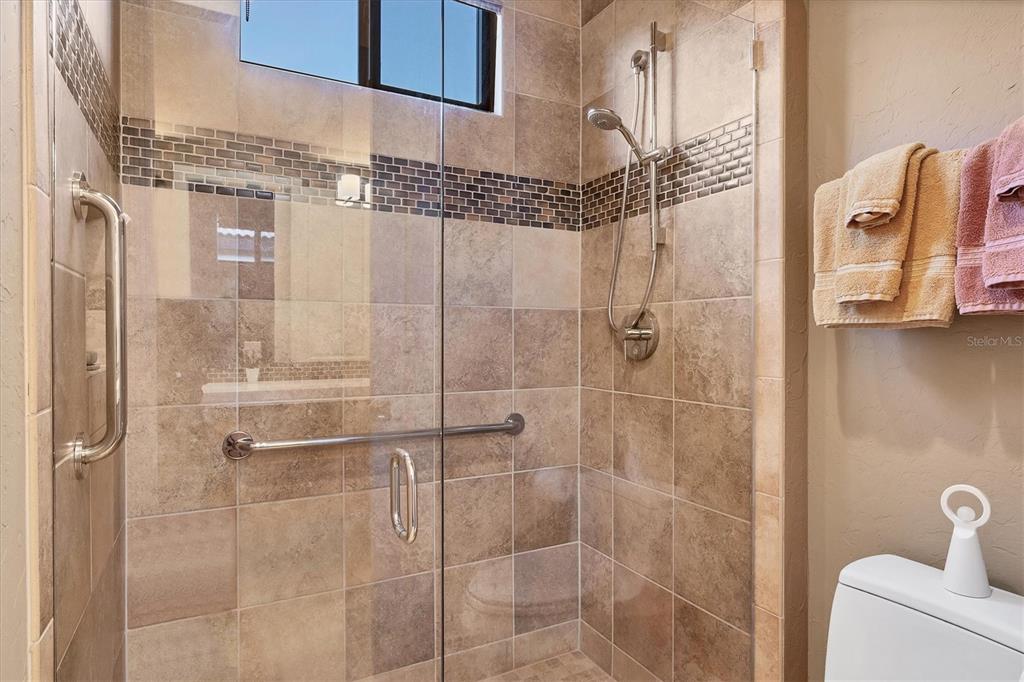 14519 Leopard Creek Place Lakewood Ranch, FL 34202 - Photo 29 of 56 a bathroom with a shower