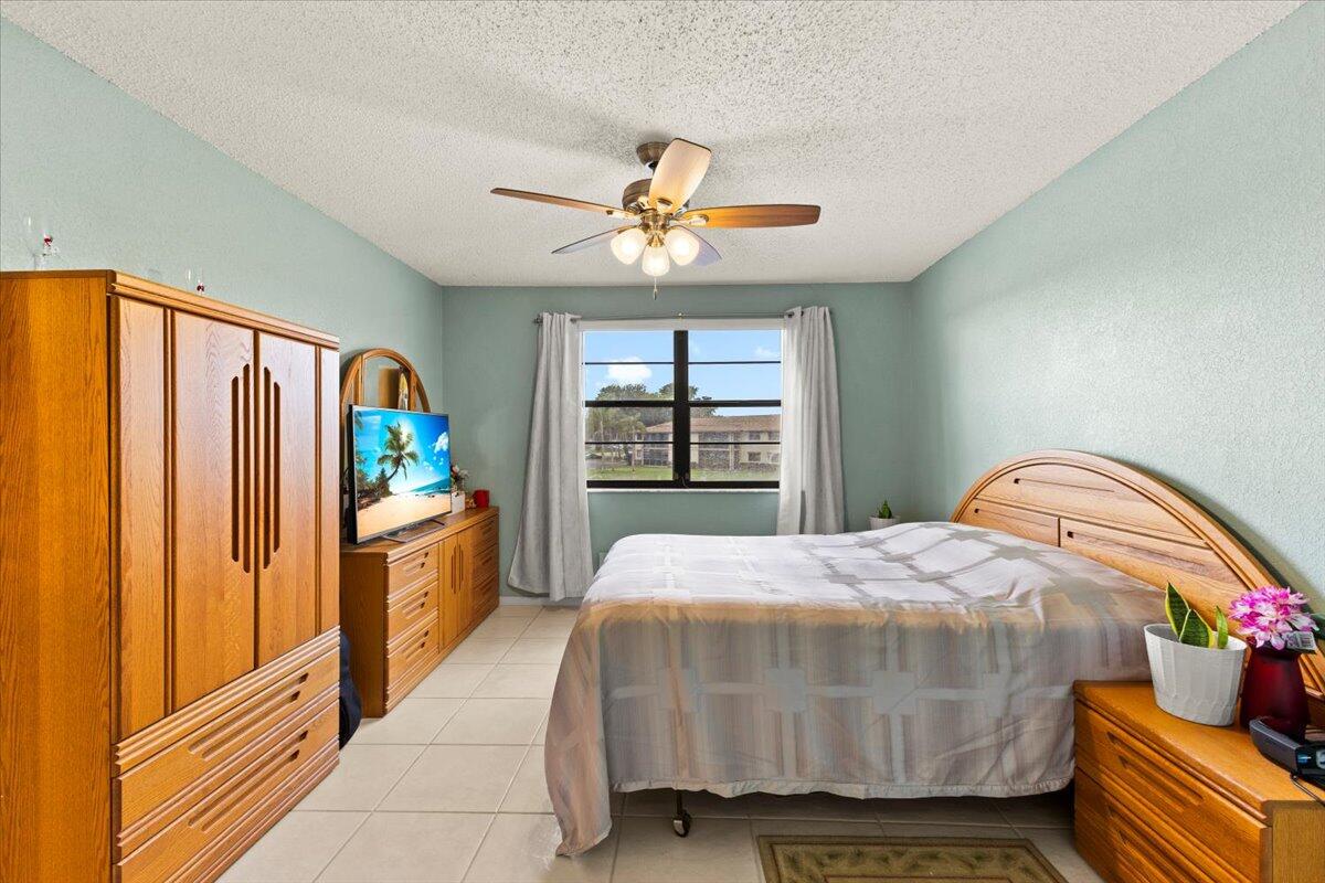 9563 West McNab Road, Unit 206 Tamarac, FL 33321 - Photo 12 of 18 master bedroom