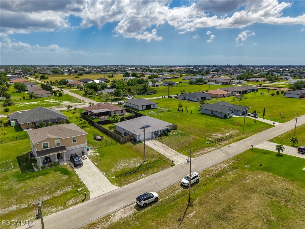 2732 Northwest 3rd Terrace Cape Coral, FL 33993 - Photo 3 of 9 an aerial view of a pool