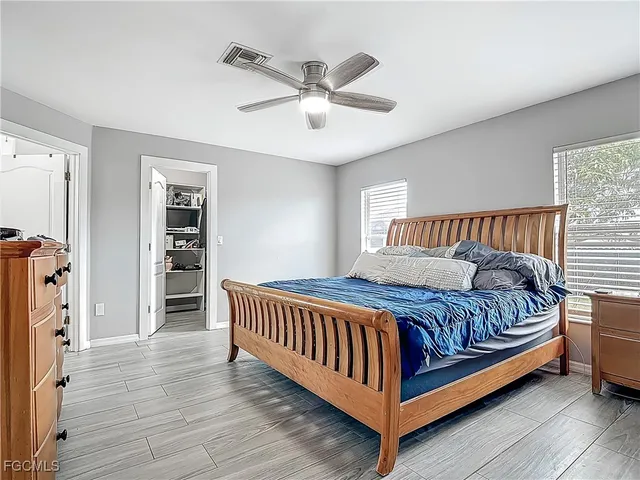 a kitchen with a sink stove and refrigerator