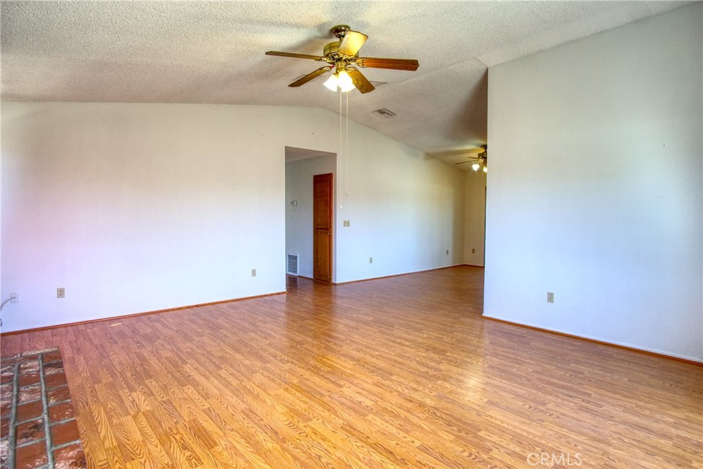 4818 Round Up Road Twentynine Palms, CA 92277 - Photo 5 of 25 wooden floor in an empty room
