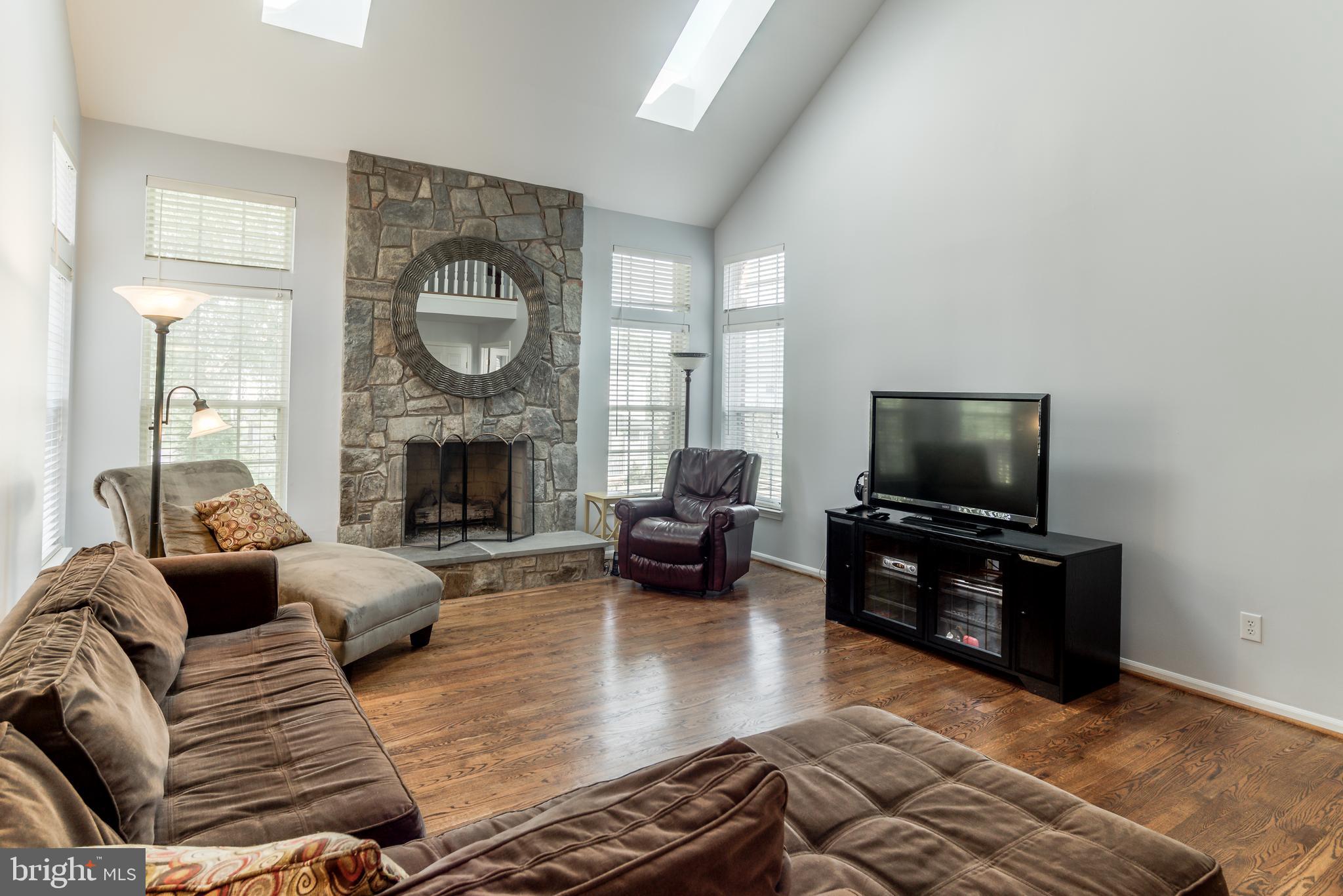 47764 Rafter Court Sterling, VA 20165 - Photo 15 of 44 Family Room with Gas Fireplace