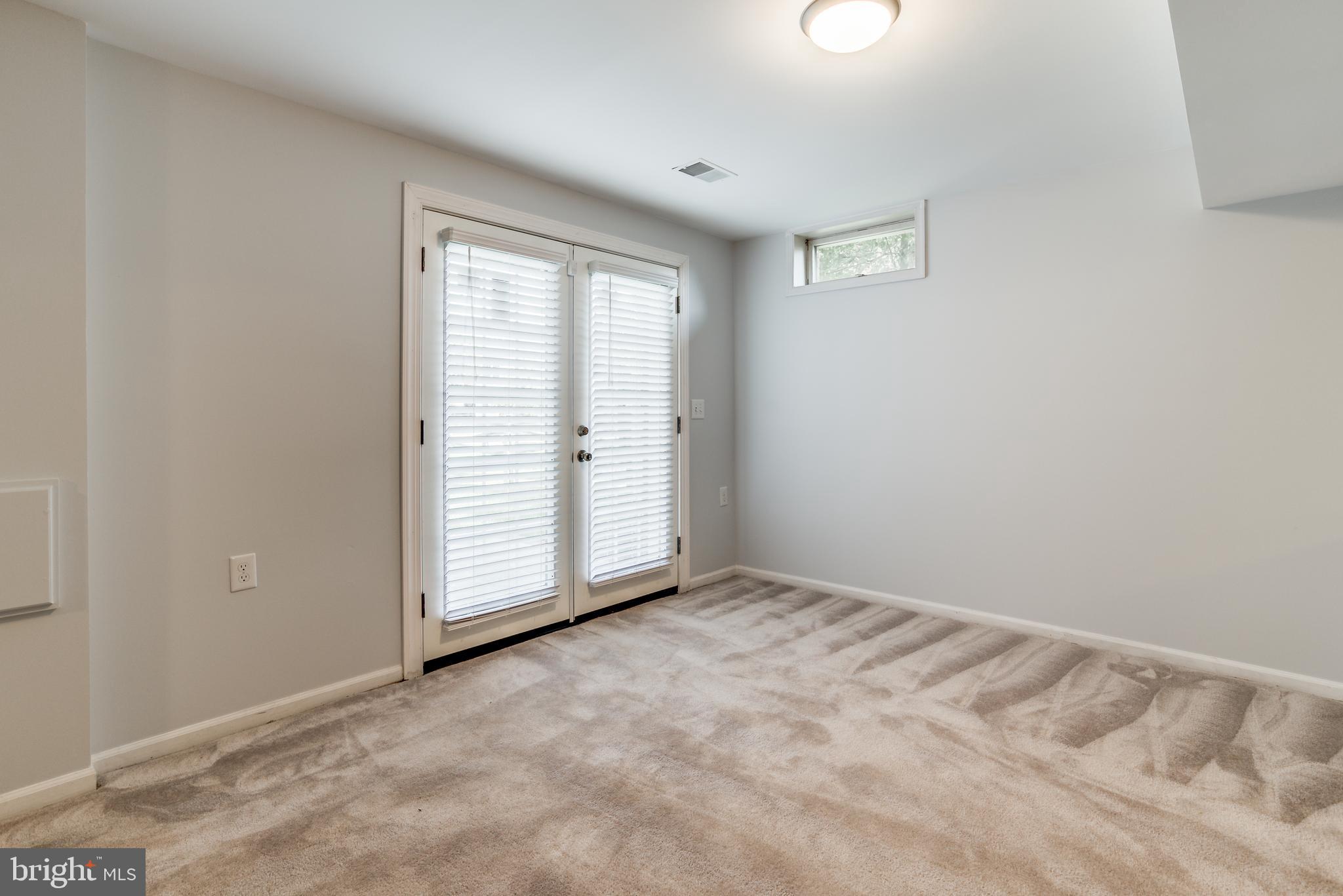 47764 Rafter Court Sterling, VA 20165 - Photo 33 of 44 Level Walk-out to Patio