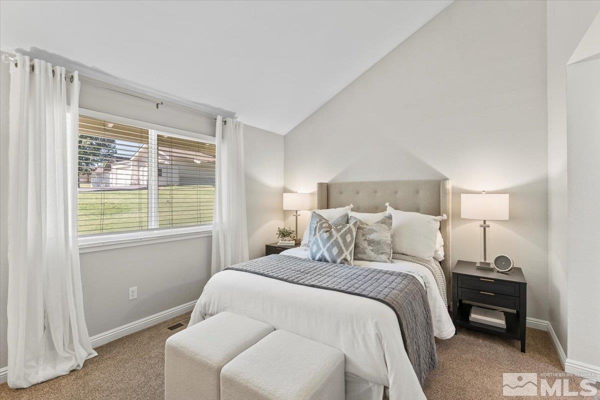 1121 Wagon Wheel Circle Reno, NV 89503 - Photo 15 of 31 a bedroom with a bed and a window
