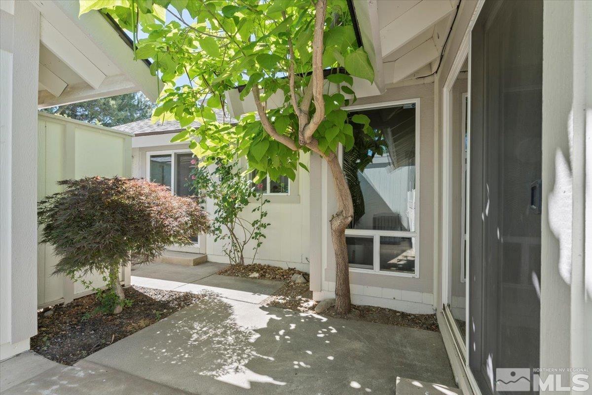 1121 Wagon Wheel Circle Reno, NV 89503 - Photo 24 of 31 a view of a house with a tree
