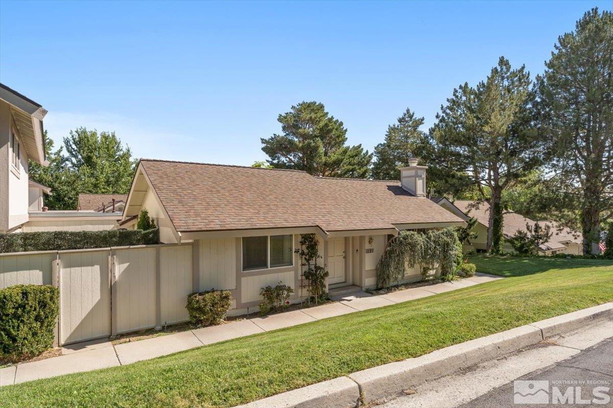 1121 Wagon Wheel Circle Reno, NV 89503 - Photo 29 of 31 a front view of a house with a yard