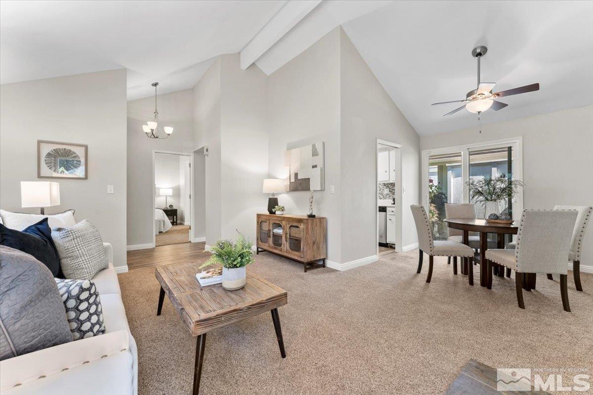 1121 Wagon Wheel Circle Reno, NV 89503 - Photo 5 of 31 a living room with furniture and a chandelier