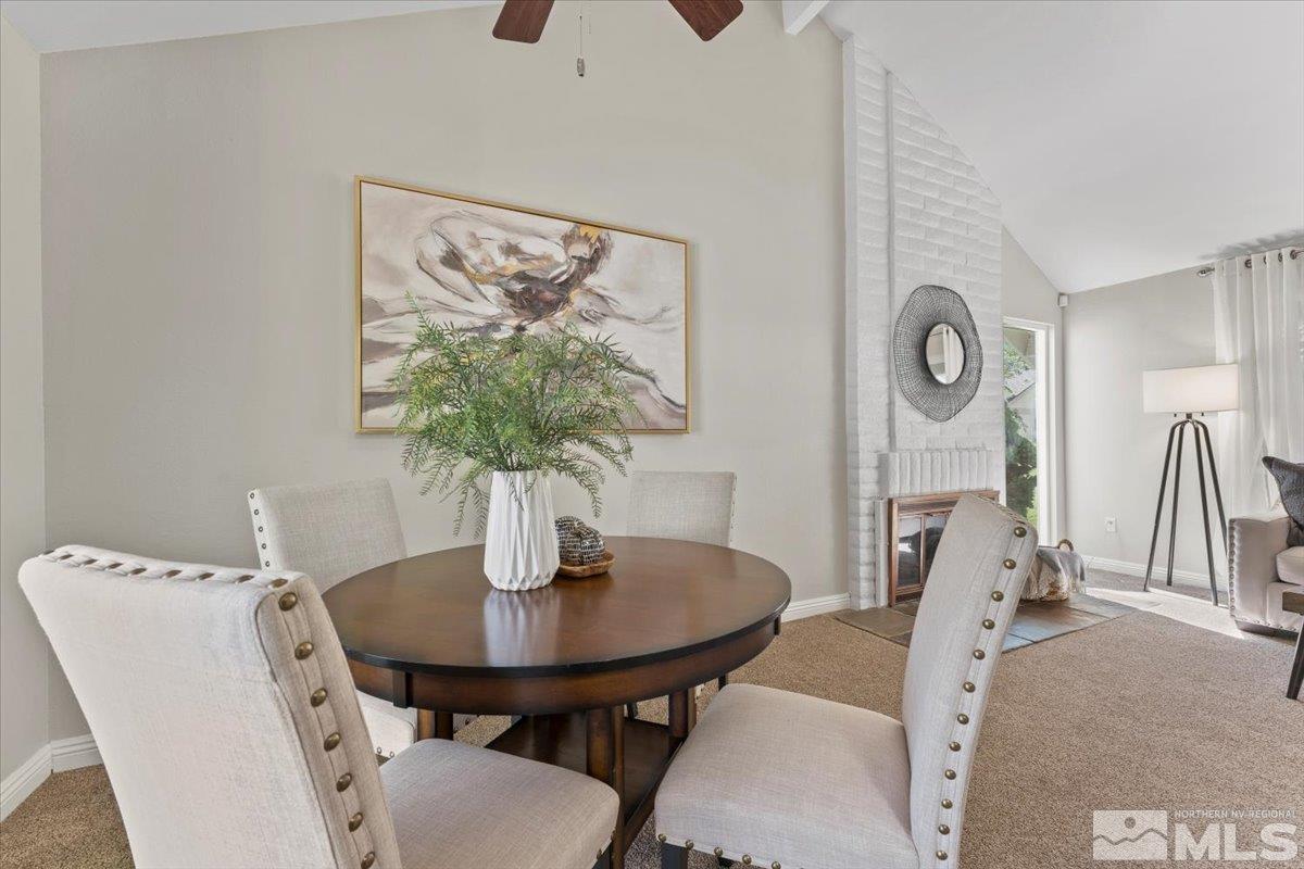 1121 Wagon Wheel Circle Reno, NV 89503 - Photo 7 of 31 a view of a dining room with furniture and wooden floor