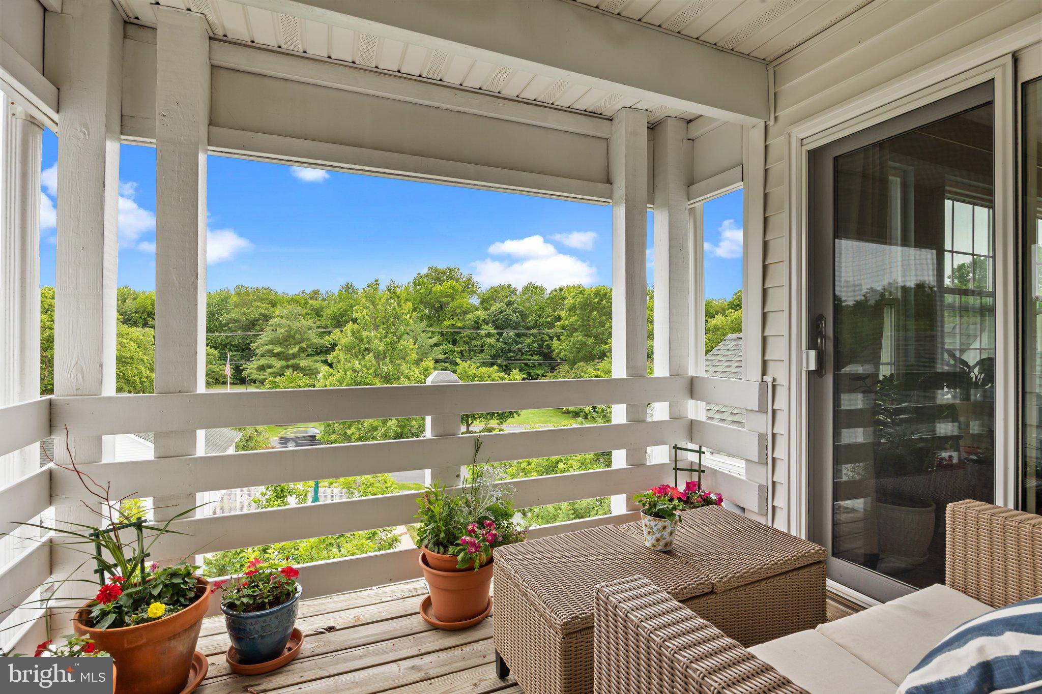 12306 Cornerstone Drive Yardley, PA 19067 - Photo 20 of 25 a living room filled with furniture and a potted plant