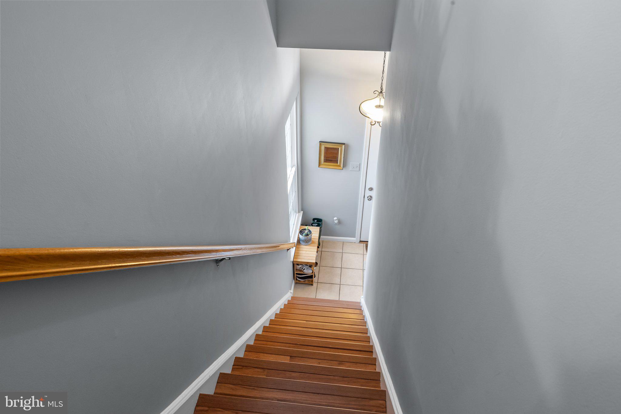 12306 Cornerstone Drive Yardley, PA 19067 - Photo 22 of 25 a view of a hallway with wooden floor and staircase