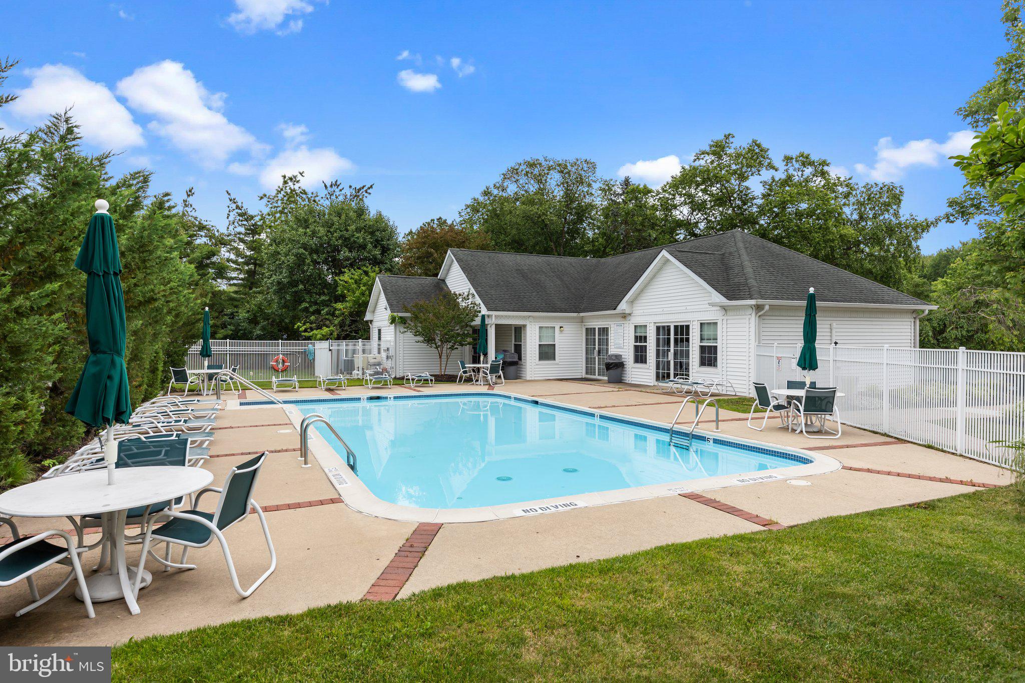 12306 Cornerstone Drive Yardley, PA 19067 - Photo 24 of 25 a view of a house with swimming pool and sitting area