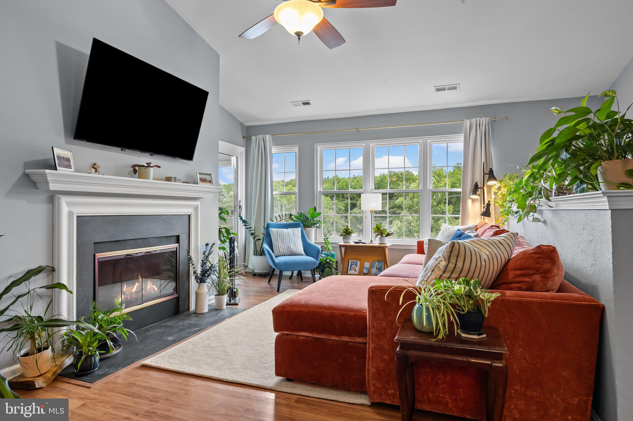 12306 Cornerstone Drive Yardley, PA 19067 - Photo 3 of 25 a living room with furniture fireplace and flat screen tv