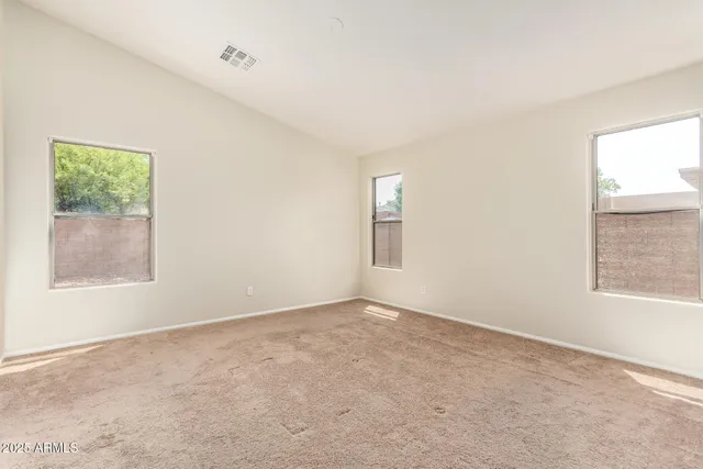 an empty room with windows