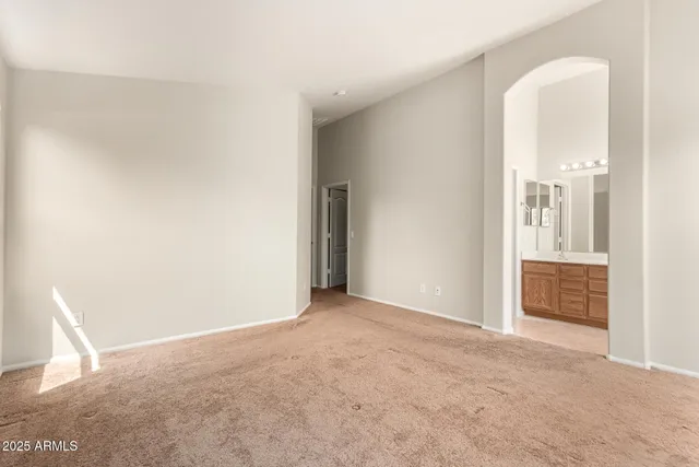 a view of a big room with closet and a bathroom