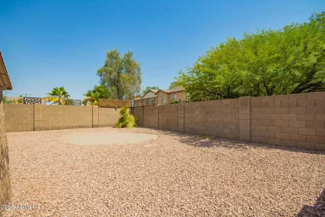 a white house covered with snow in the background