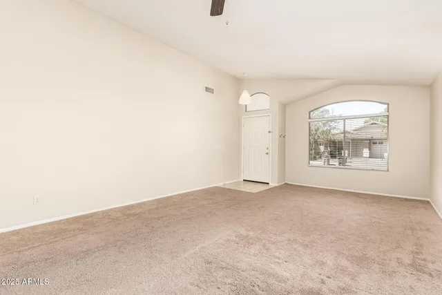 an empty room with windows