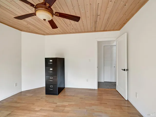 a spacious bathroom with a sink and a bathtub