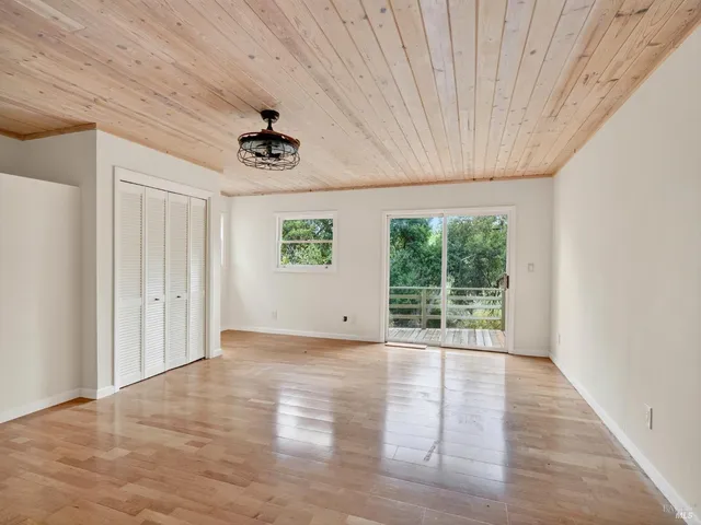 a view of balcony and trees
