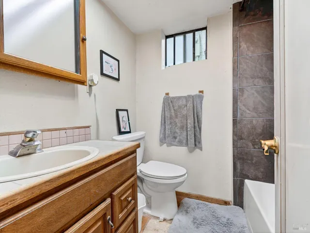 a view of lake with a tree