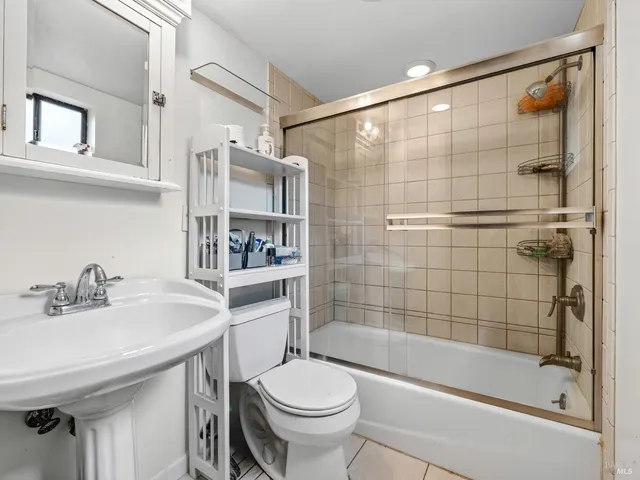 a view of balcony with wooden floor