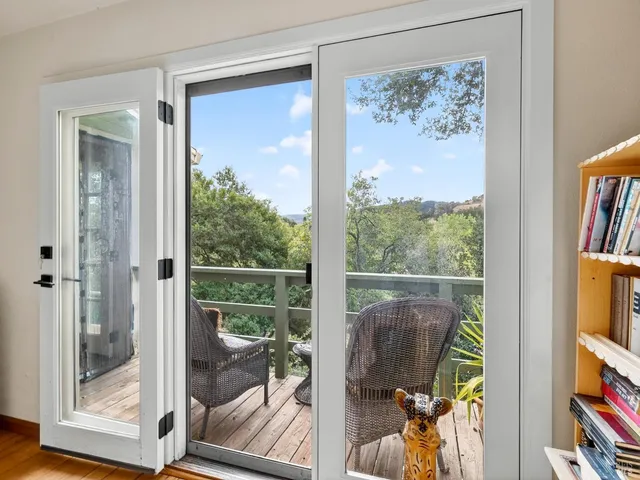 a view of a porch and garden view