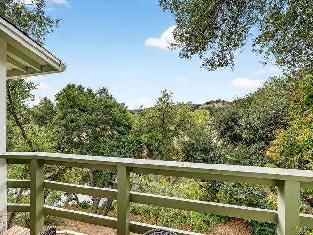 a view of a balcony with outdoor space
