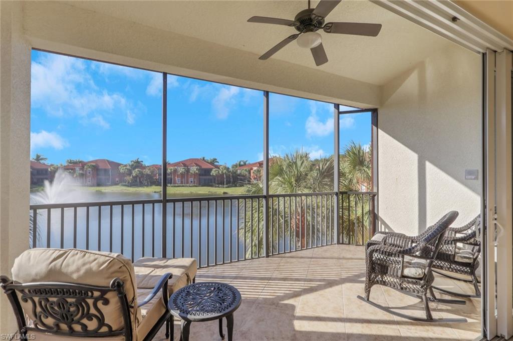 6397 Legacy Circle, Unit 2003 Naples, FL 34113 - Photo 15 of 26 a living room with furniture and a large window
