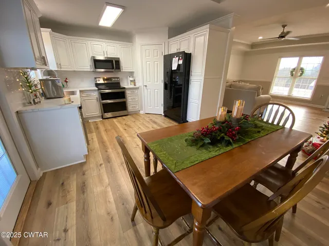 a view of a dining room with furniture